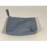 Fifteen Clarins wash bags.