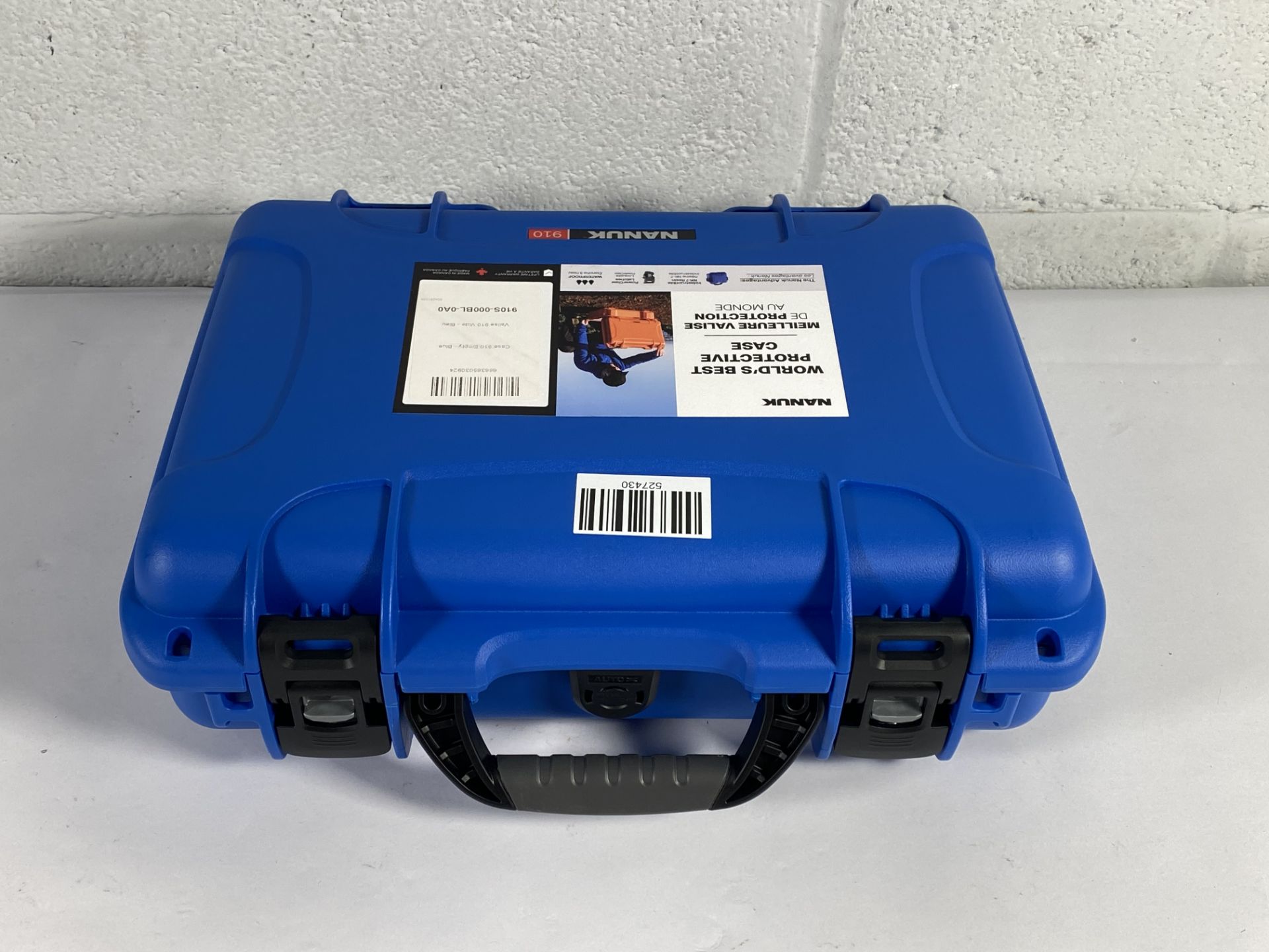 A Nanuk 910 protection case (empty inside).
