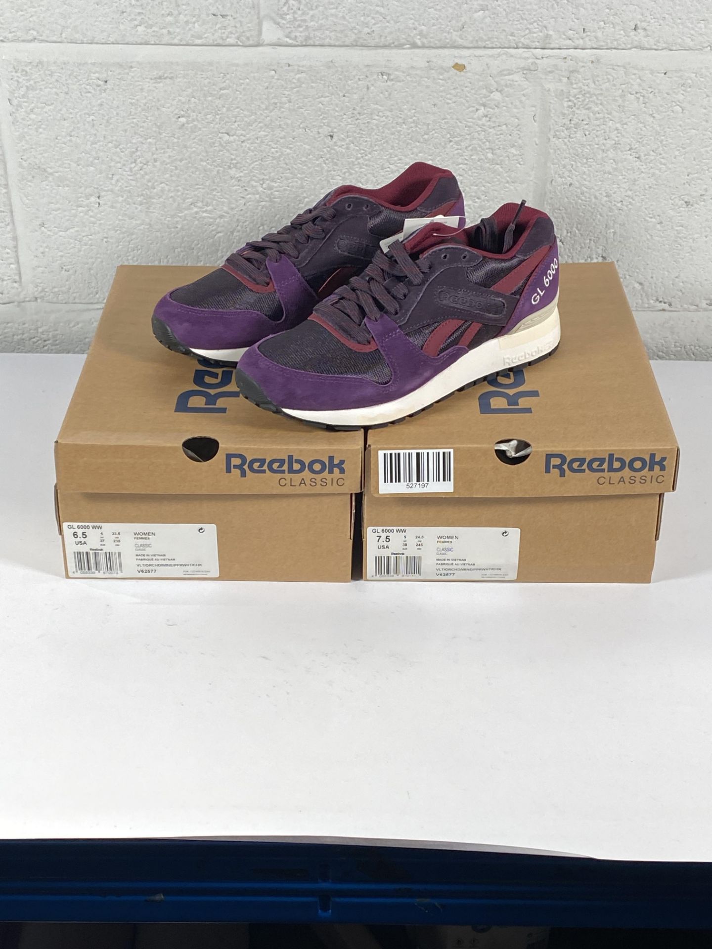 Two pairs of women's Reebok GL6000 trainers (UK 4 and UK 5).