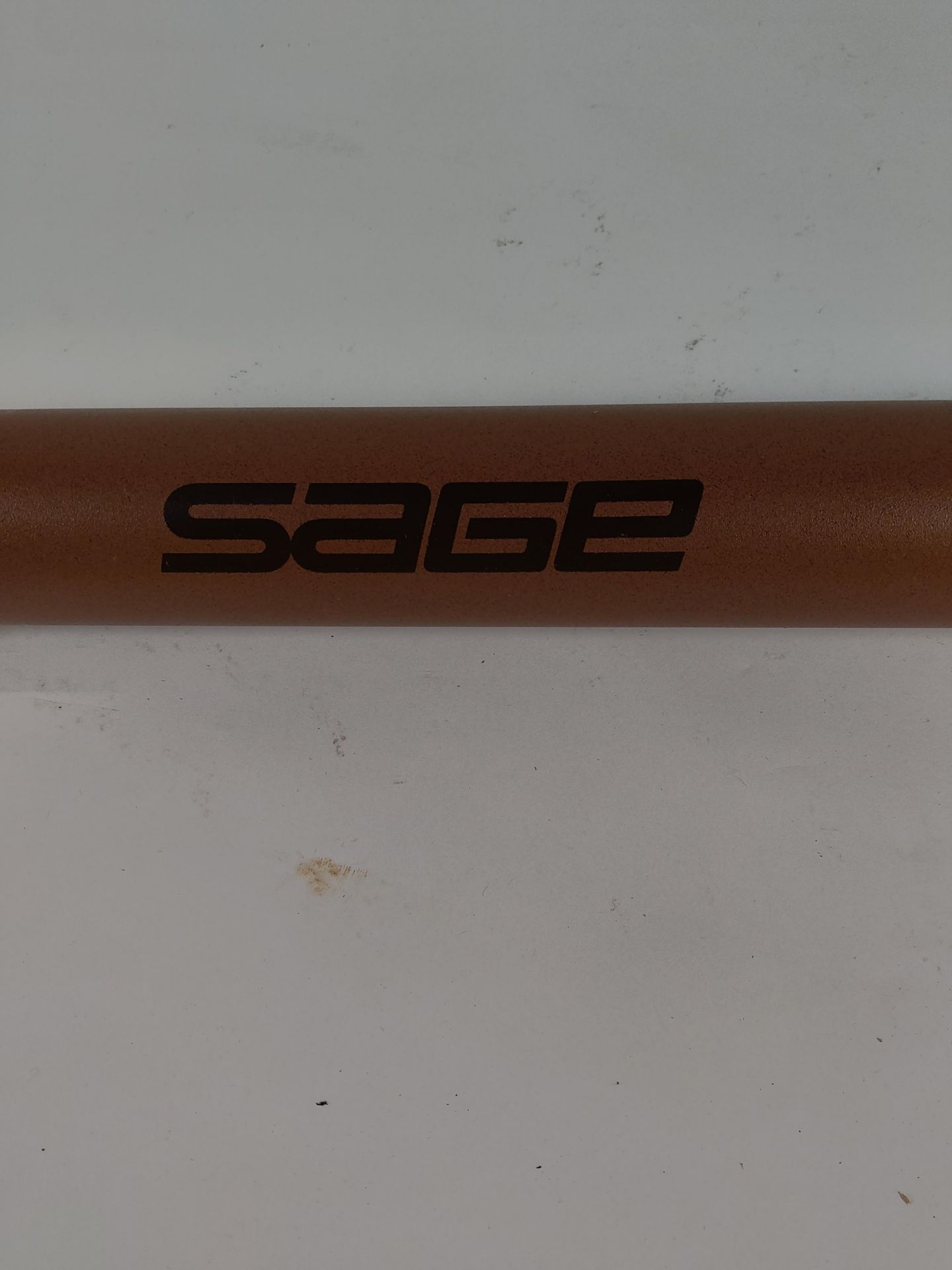 A pre-owned Sage SLT 490-4 fly fishing rod.