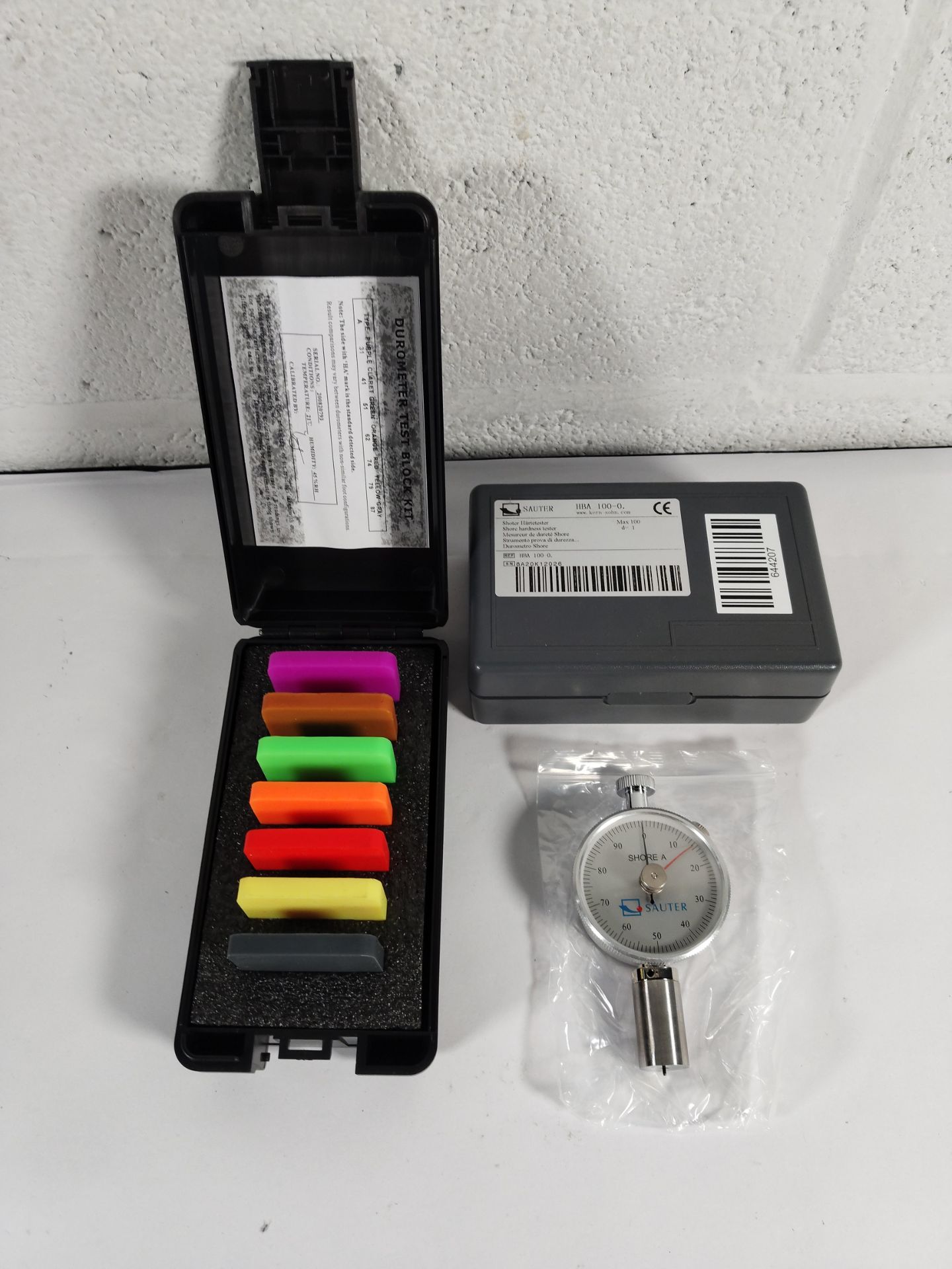 An as new Sauter shore hardness tester (REF: HBA 100-0.) with an as new Sauter AHBA-01 hardness test
