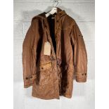 A pre-owned Stone Island Mussola Gommata Compass Patch Long Line Jacket, XXL (arm patch missing).