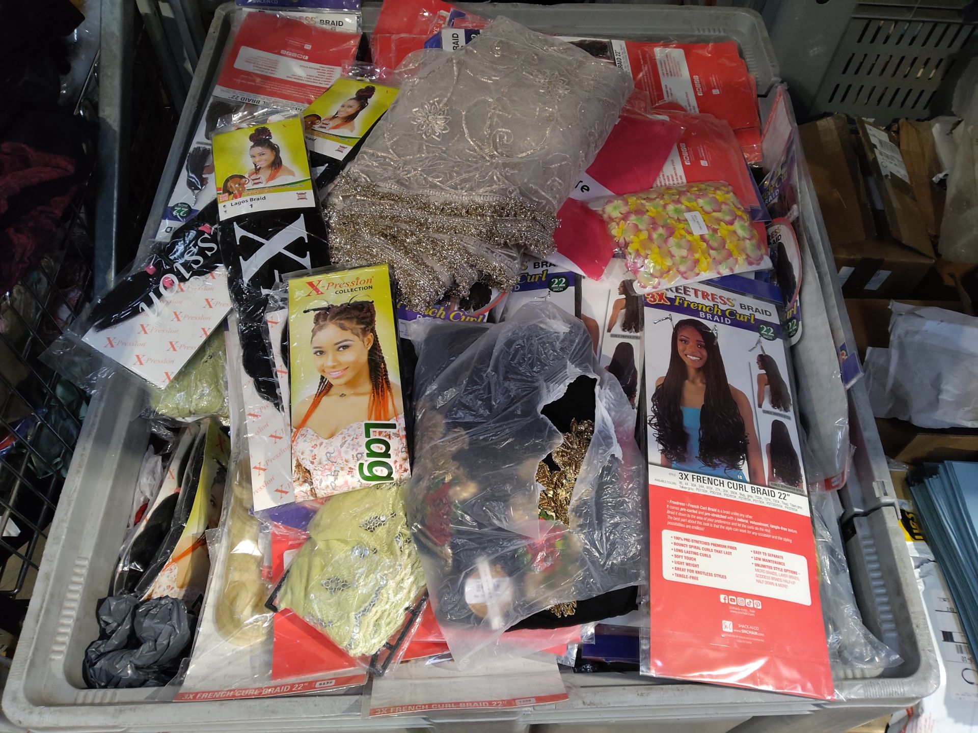 Large collection of imitation wigs and braids and assorted Asian style clothes. (Stillage not includ