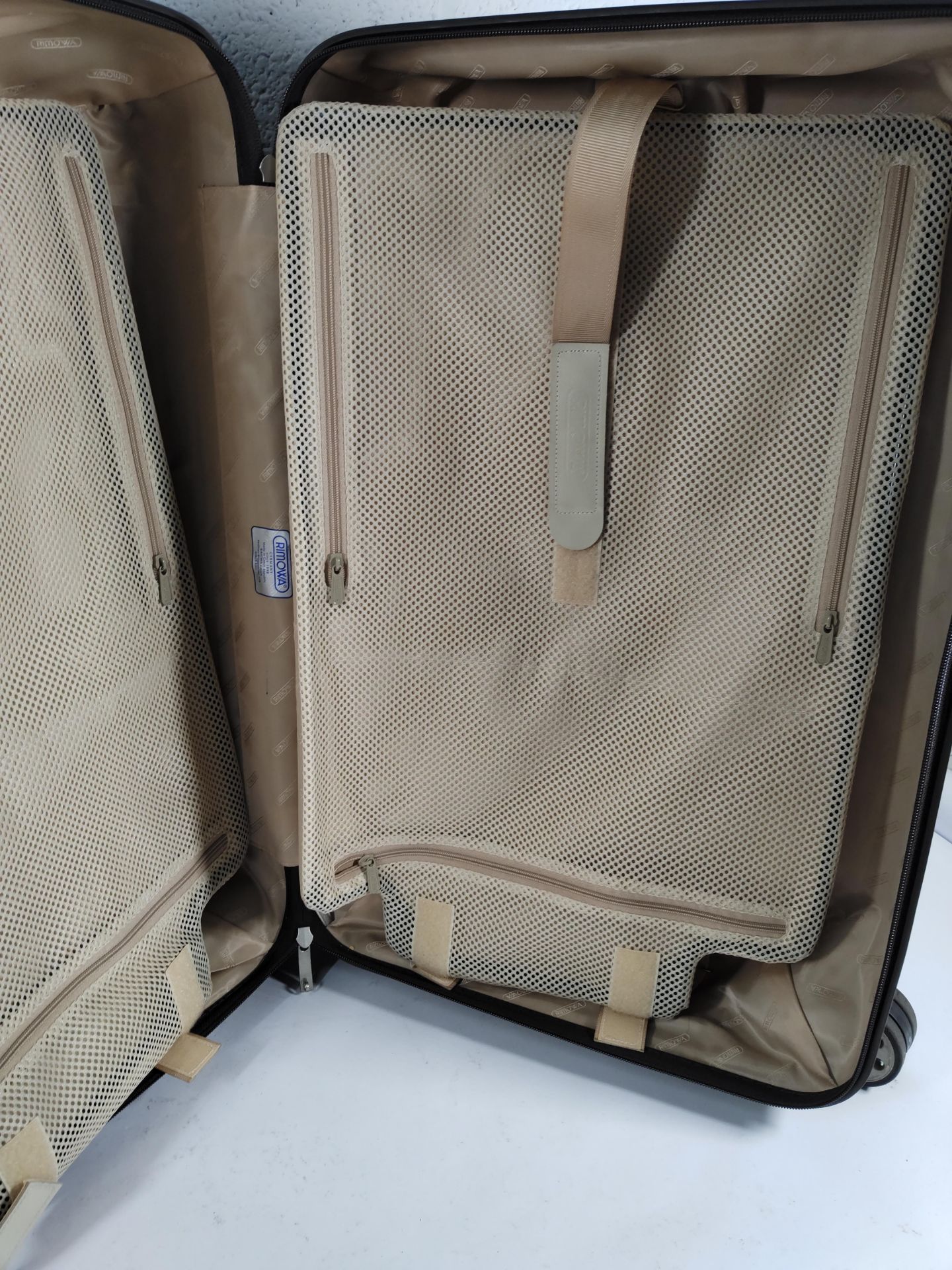 A pre-owned Rimowa polycarbonate shell wheeled suitcase. (H65 - L40). - Image 6 of 6