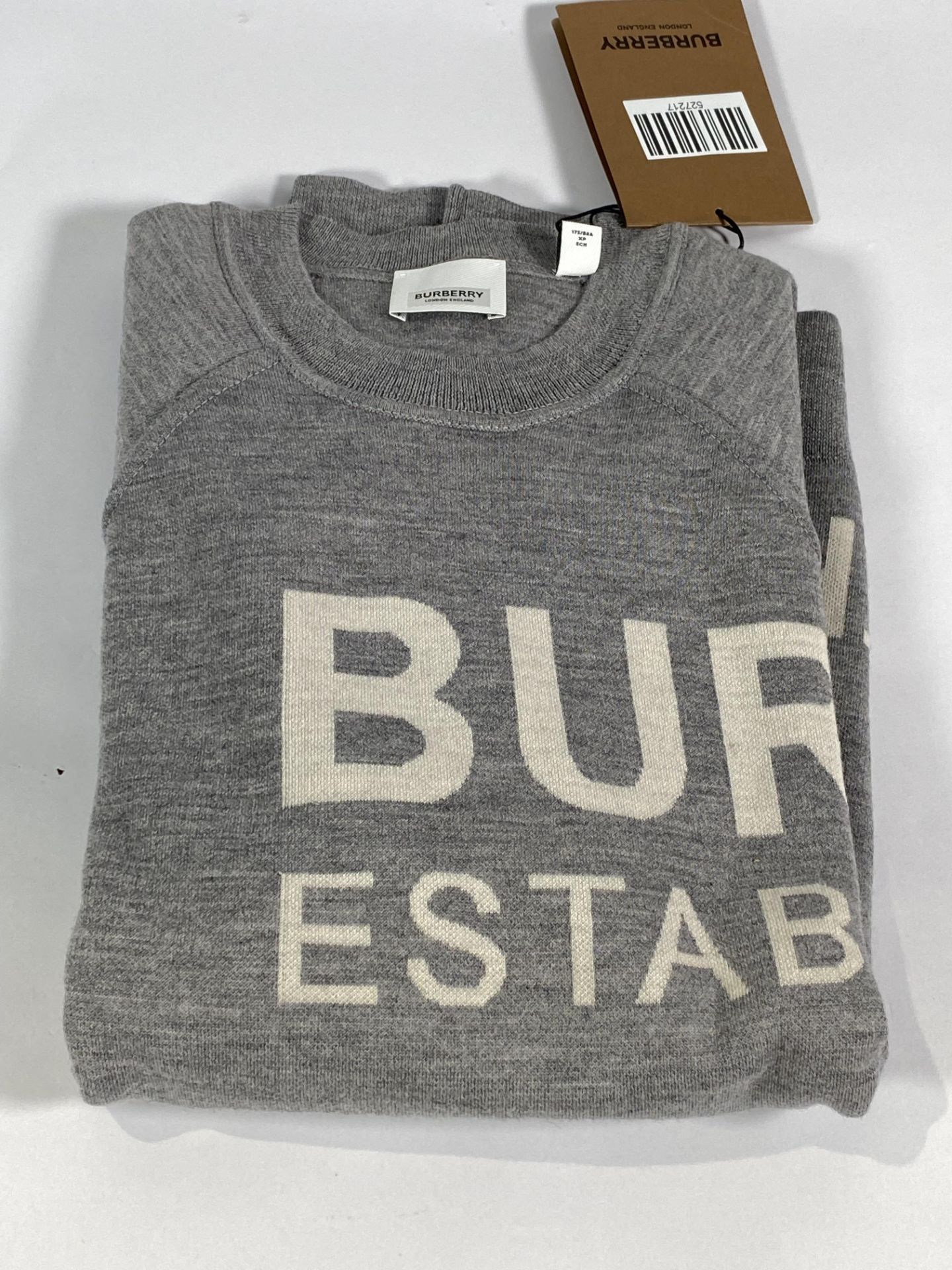 A Burberry wool jumper (XS).