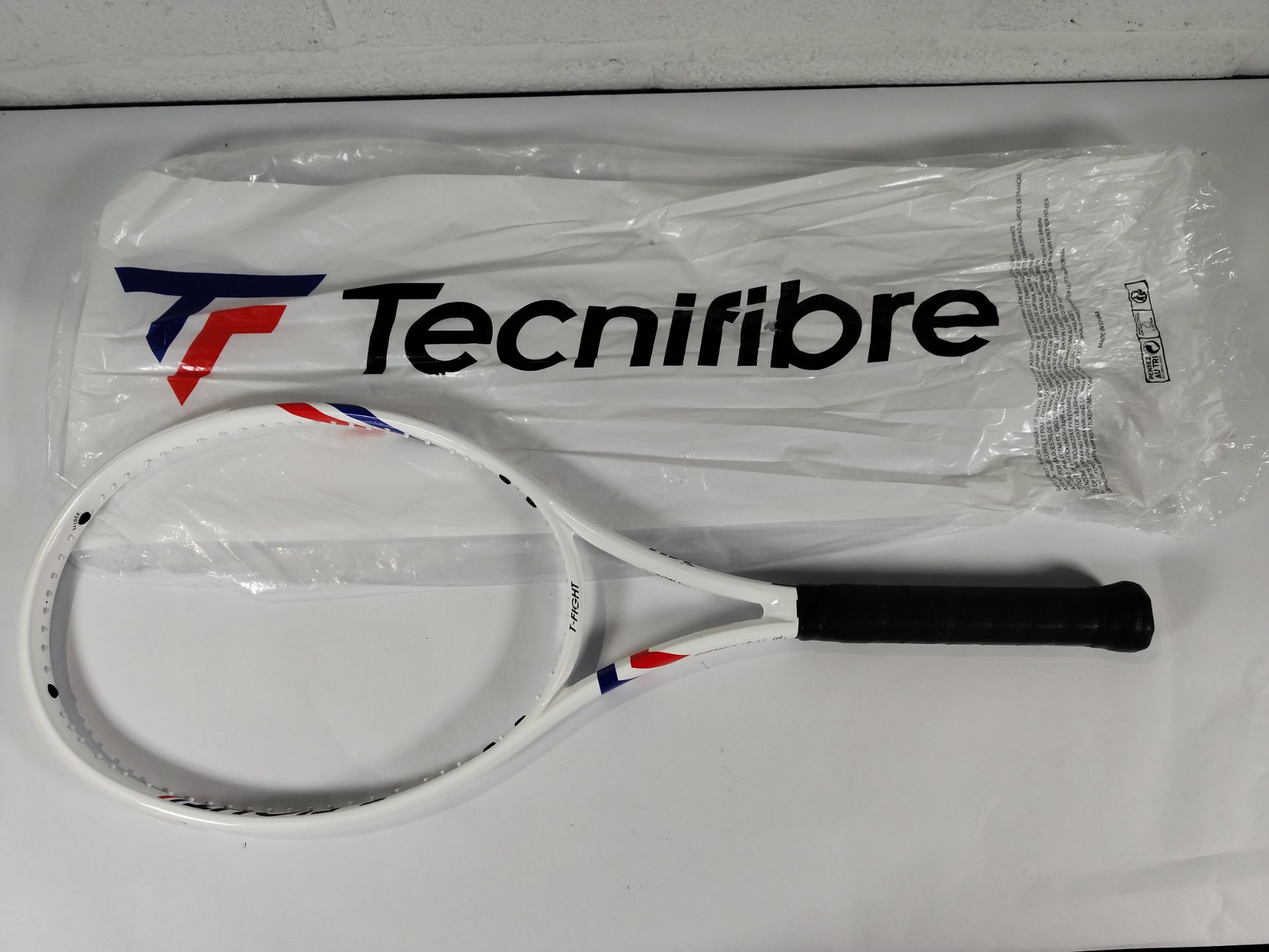 A Technifibre T-Flight 300 unstrung tennis racket (Note: racket has some minor damage and has been p