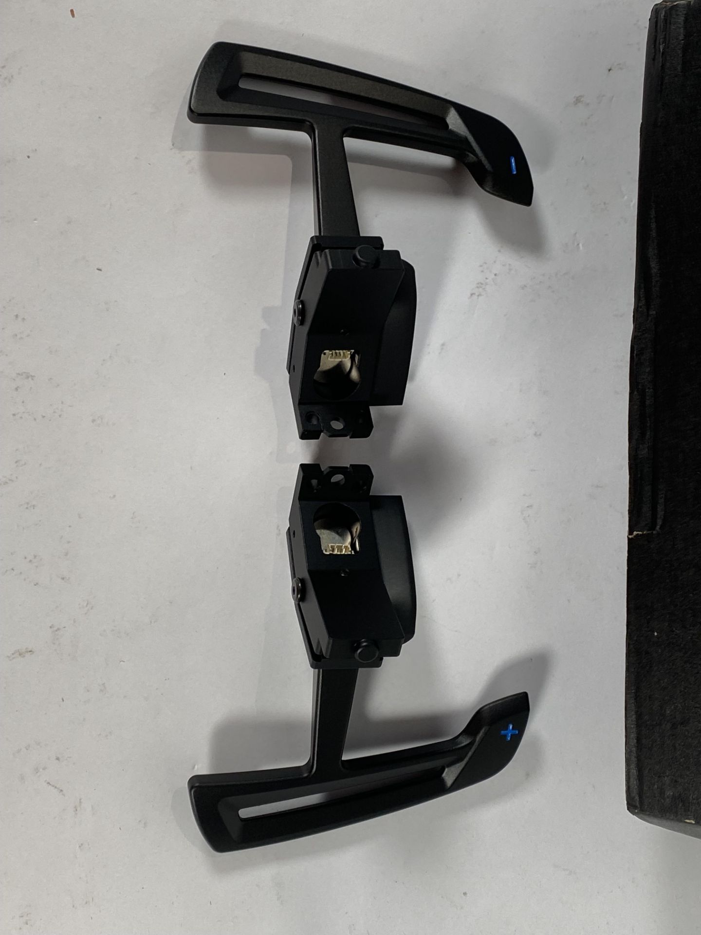 An as new set of Ninemeister 9m magnetic PDK billet paddle shifters for a Porsche 992.1.