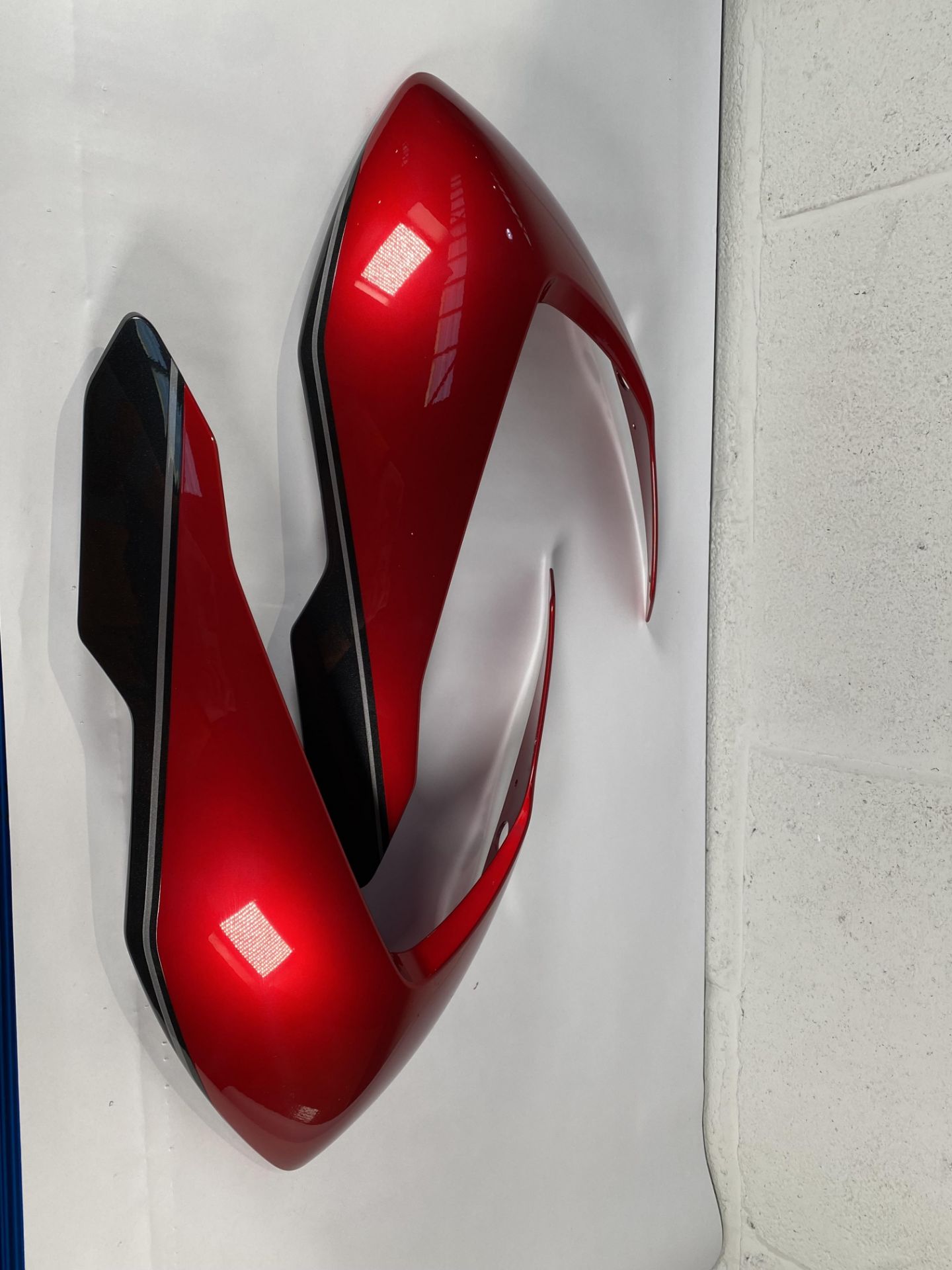 A set of Triumph Fairing panel and pads for a Triumph Speed Triple 1200 RR.