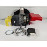 A Riello RDB2.2 Burner, BX V15-26, damage to the metal and the plastic casing.