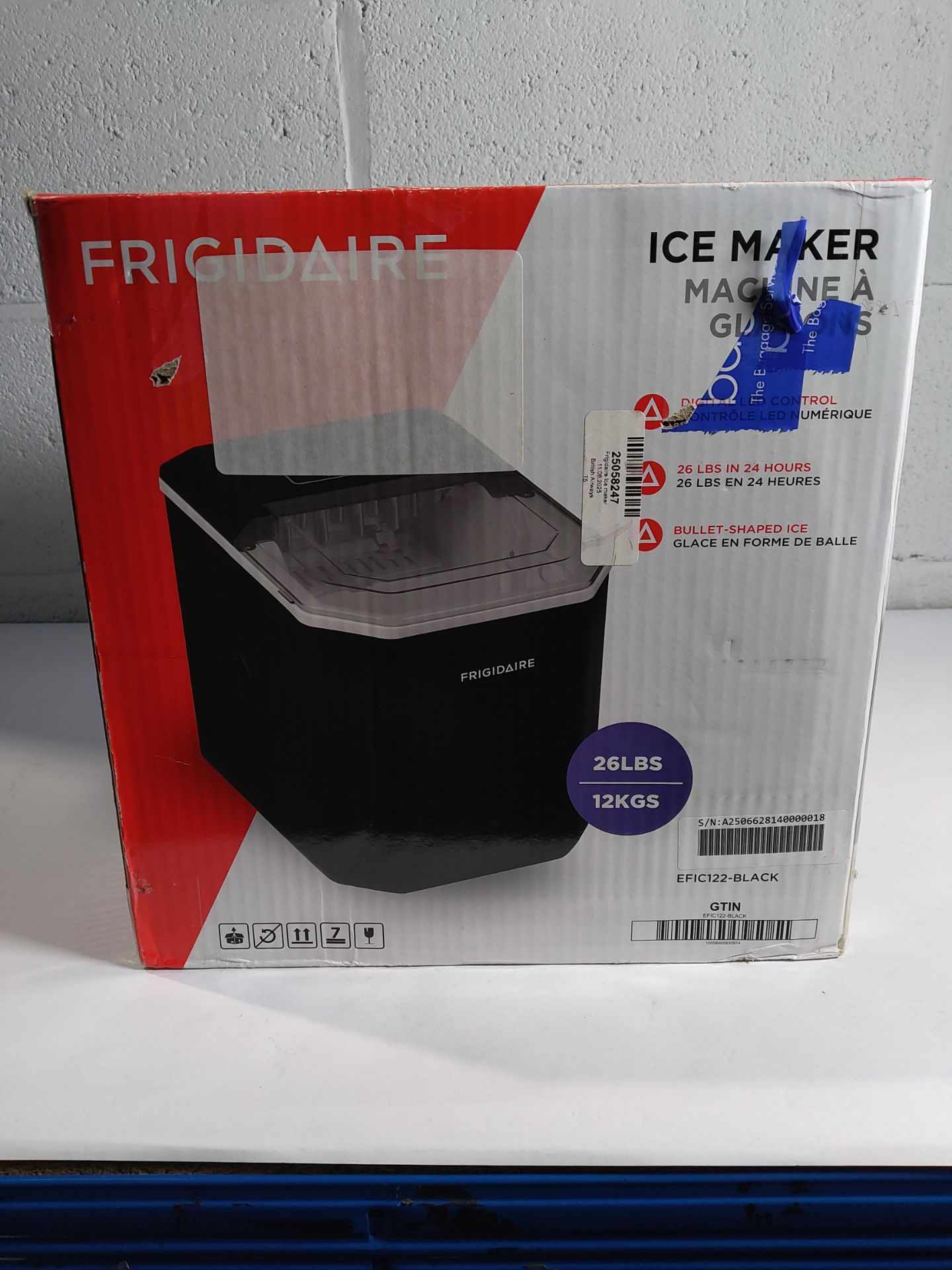 An Fridgidaire EFIC122-Black ice maker (box unsealed).