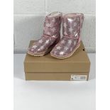 A pair of children's Ugg Classic Short 2 sequin star boots (UK 3).