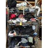 A large quantity of assorted as new and pre-owned clothing in four baskets.