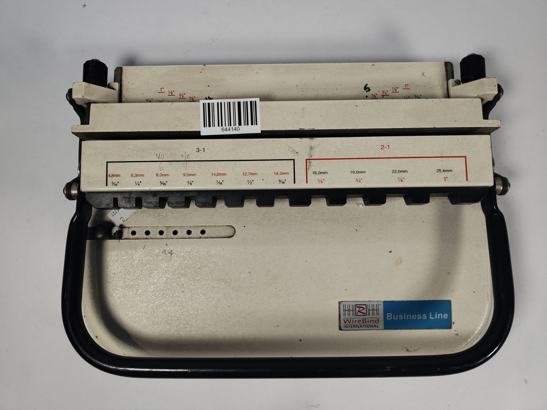 A pre-owned WireBind International Business Line binder.