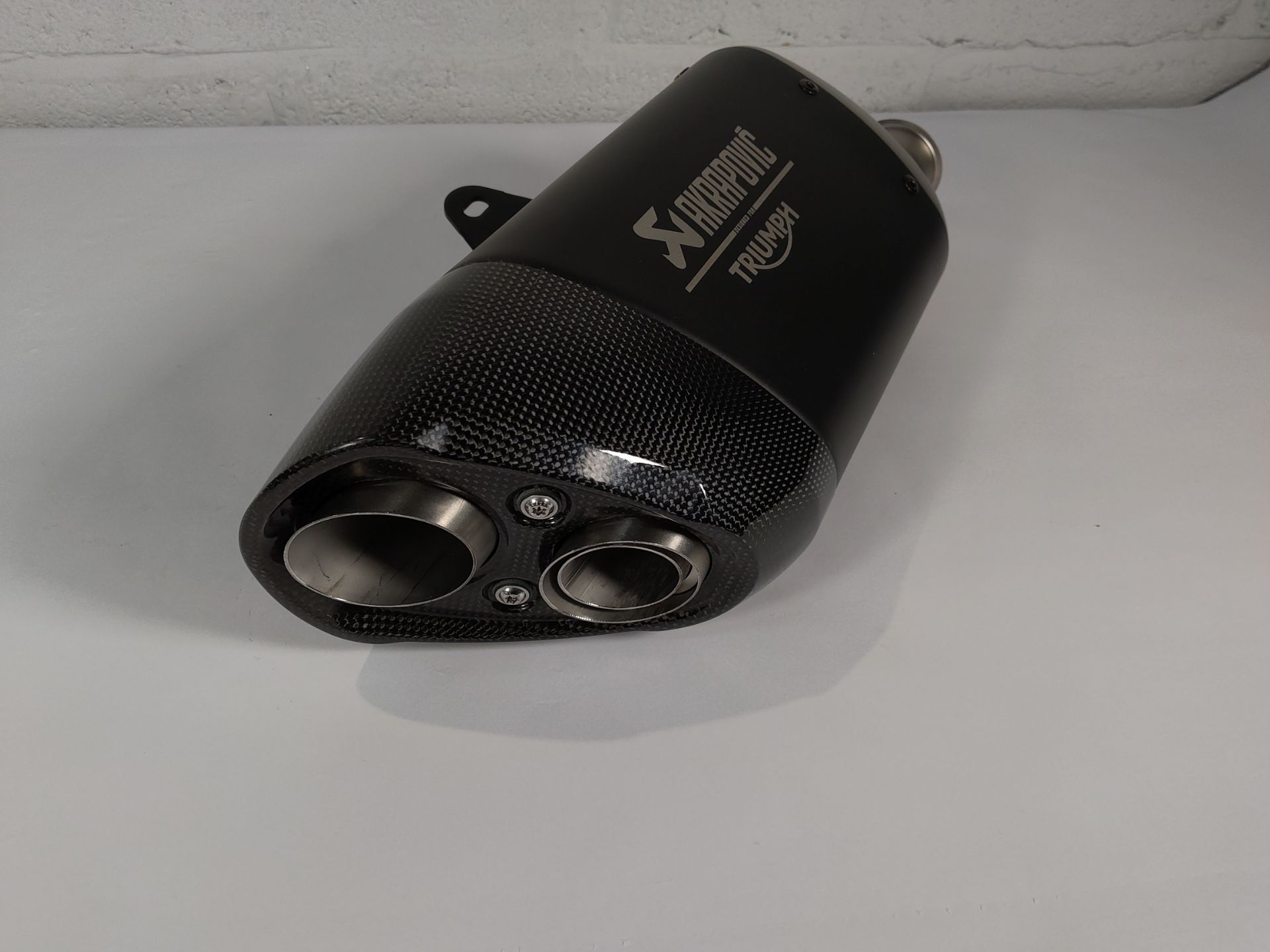 As new Akrapovic titanium slip-on exhaust silencer for Triumph Triple 1200 RS or RR Motorcycle. - Image 3 of 4