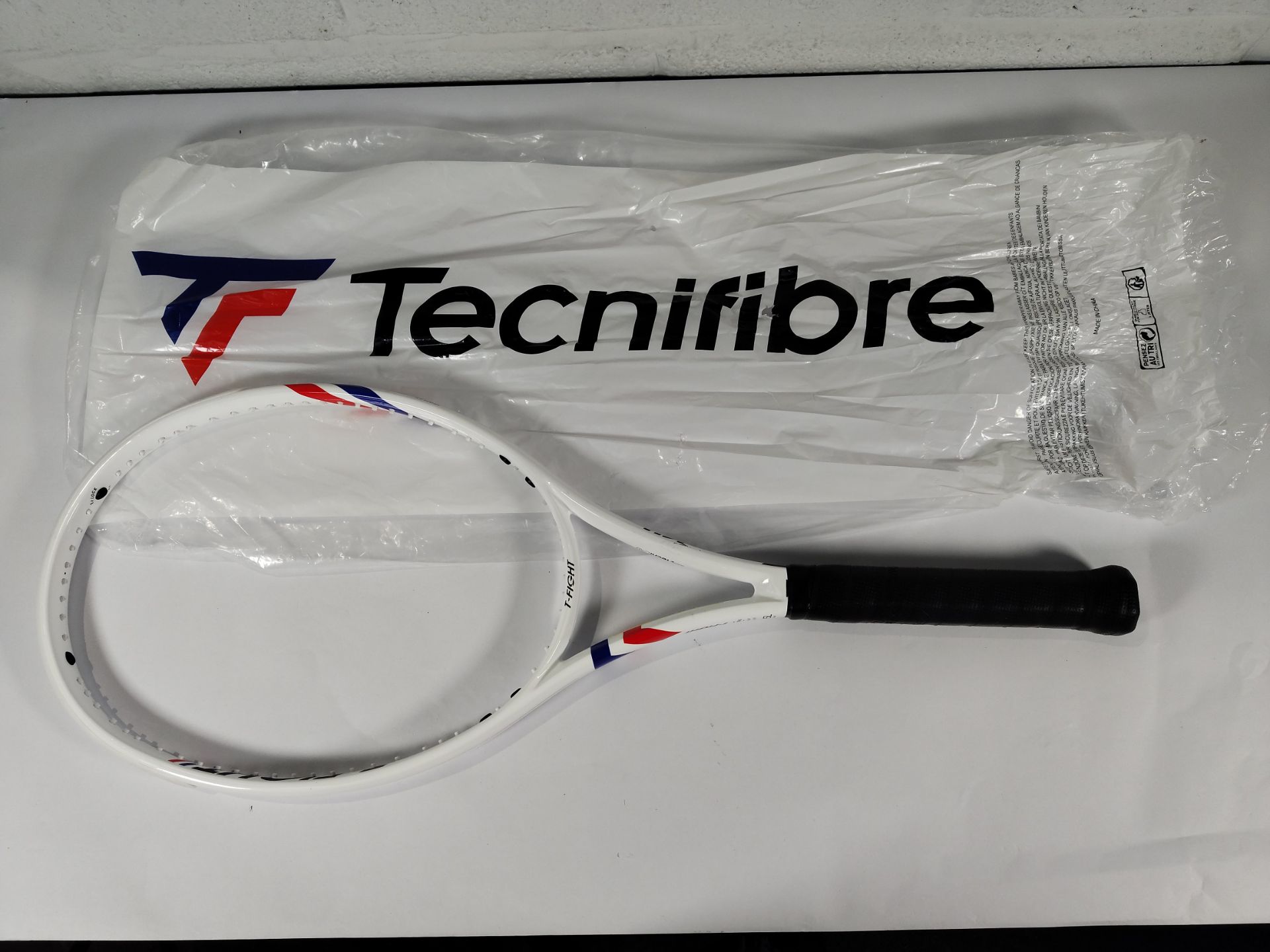 A Technifibre T-Flight 300 unstrung tennis racket (Note: racket has some minor damage and has been p
