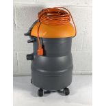 An as new Taski Vacumat 22 (missing hose).