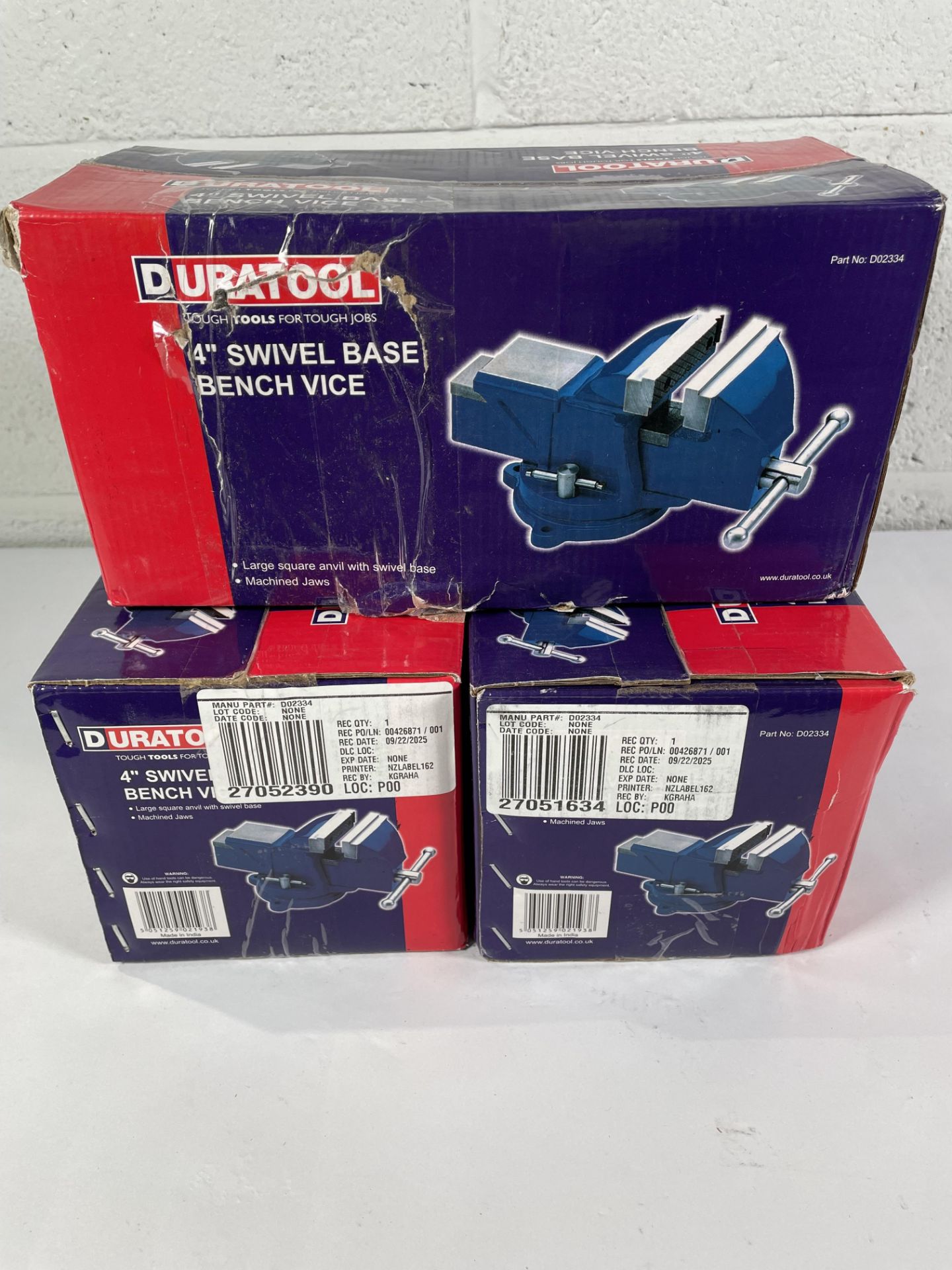Three boxed as new Duratool D02334 Swivel Bench Vice, 4".