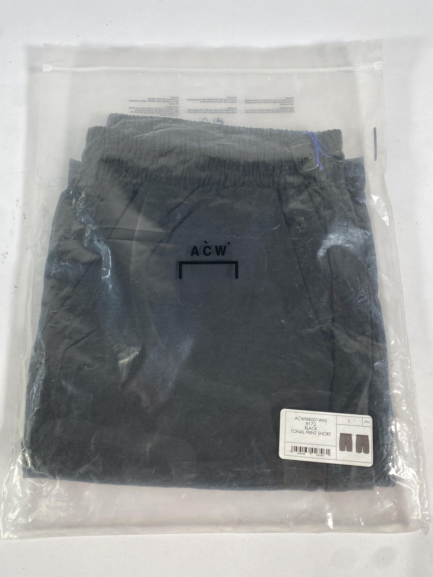 A pair of A-Cold wall tonal print short (Large).