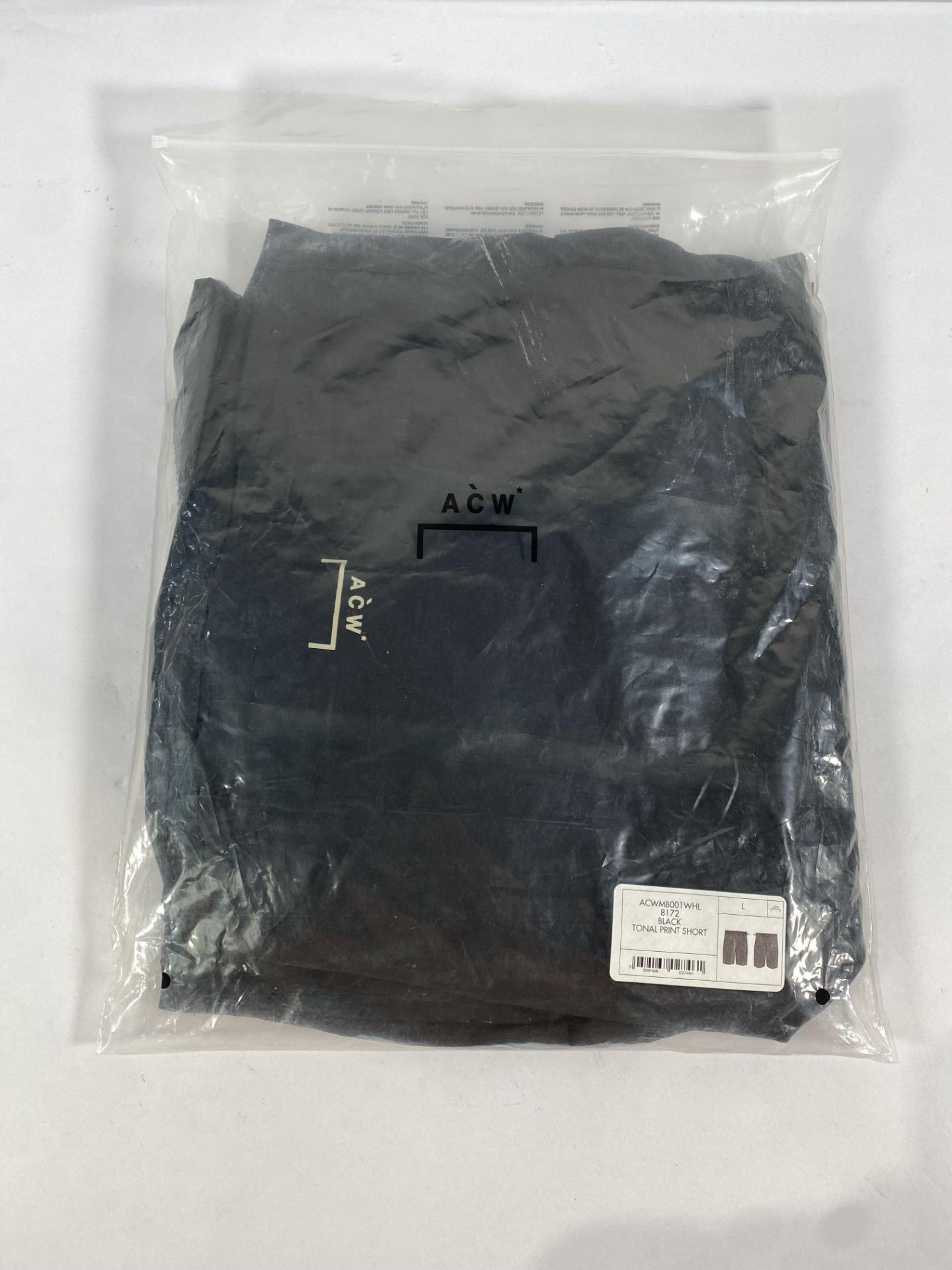 A pair of A-Cold wall tonal print short (Large).