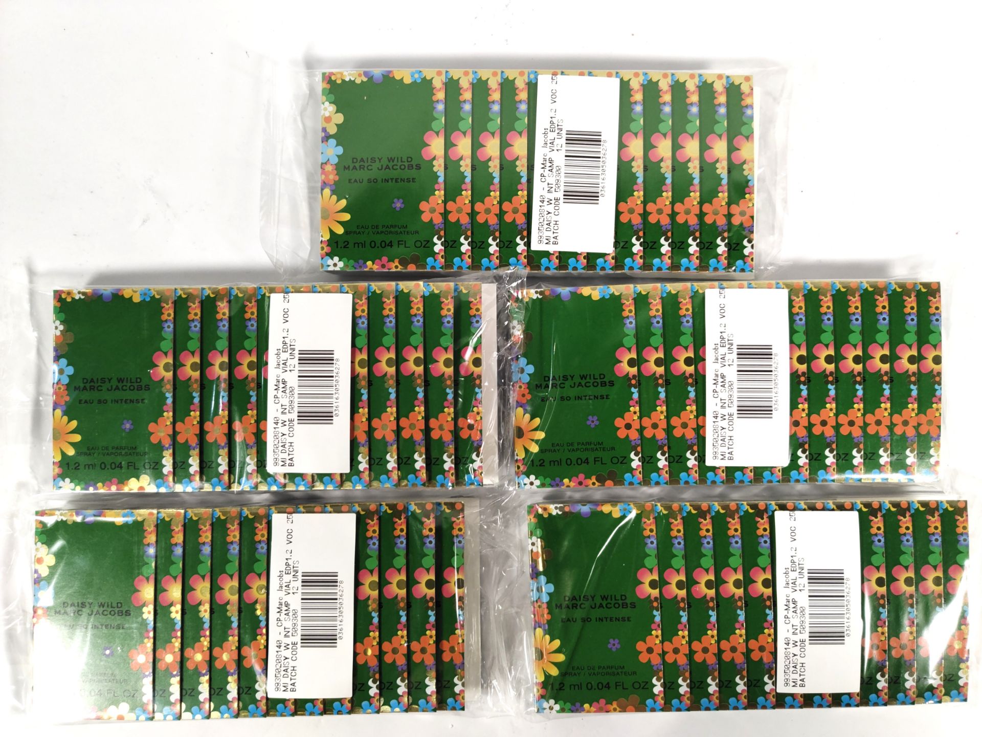 Five packs of Marc Jacobs Daisy Wild So Intense 1.2ml EDP fragrance vials (12 per pack - 60 total).
