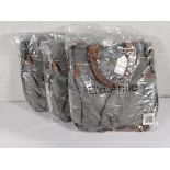 Three as new Ella Amie baby changing bag with included changing mat.