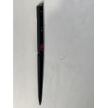 A gloss black left hand side strake assembly kit for a 2025 Aston Martin Vanquish Super GT V12.