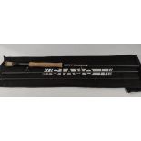A pre-owned Orvis Helios 3F fly rod.