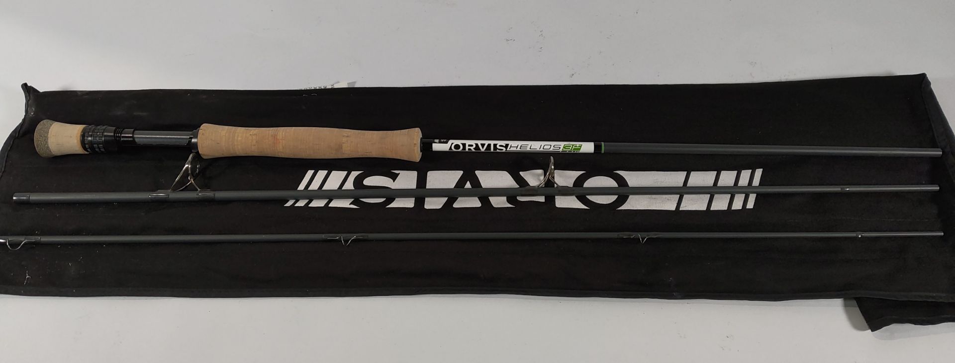 A pre-owned Orvis Helios 3F fly rod.