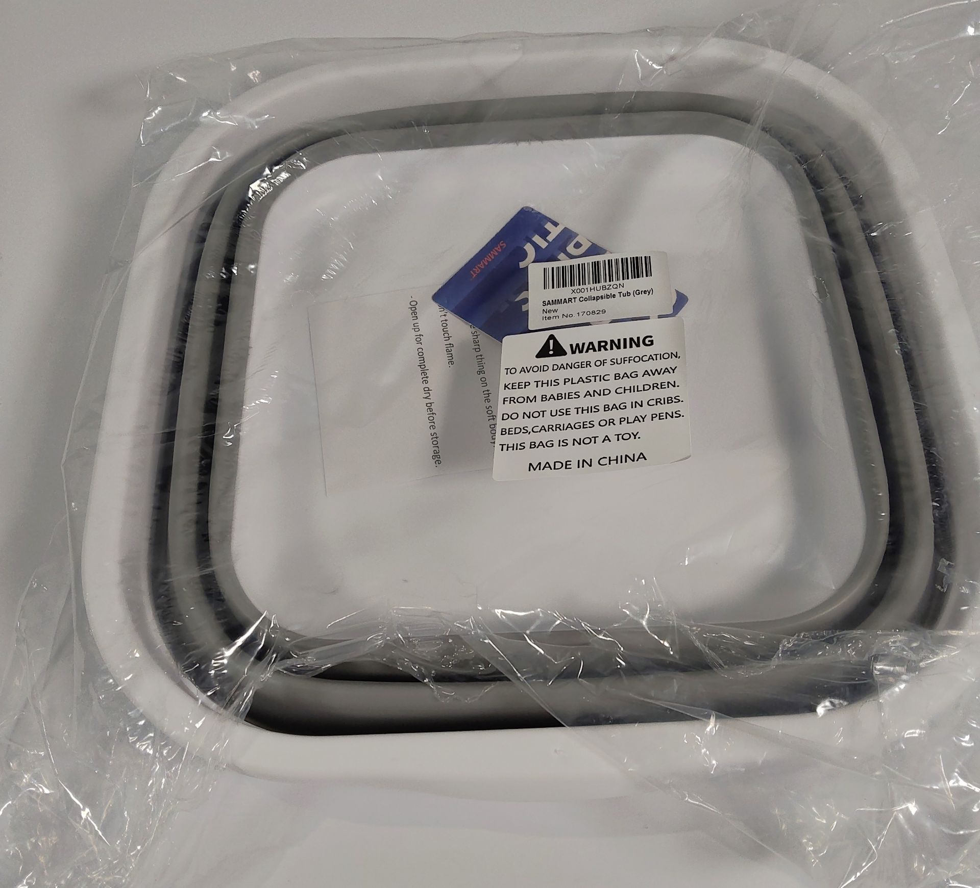 Fourteen Sammart grey collapsible tubs.