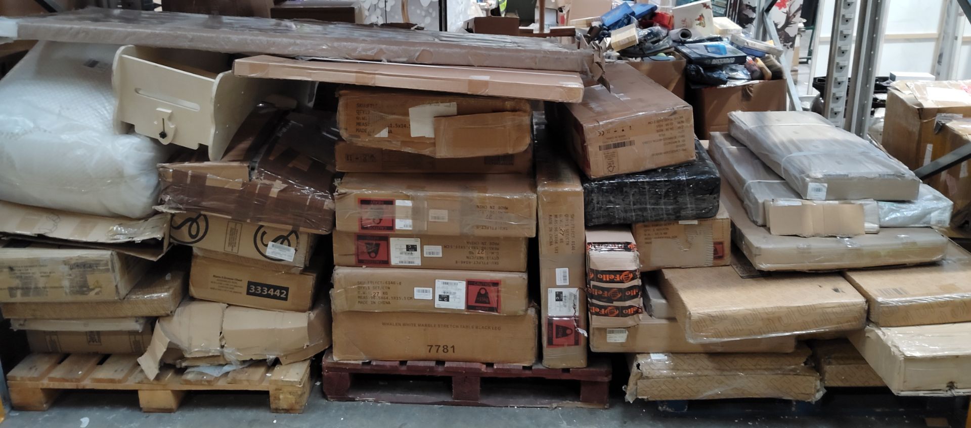 A large quantity of assorted flatpack furniture and related.