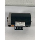 A Century AC motor (serial number 11024J2).