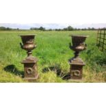 PAIR HEAVY CAST IRON URNS ON PLINTH IN VERDI GREEN BRONZE FINISH