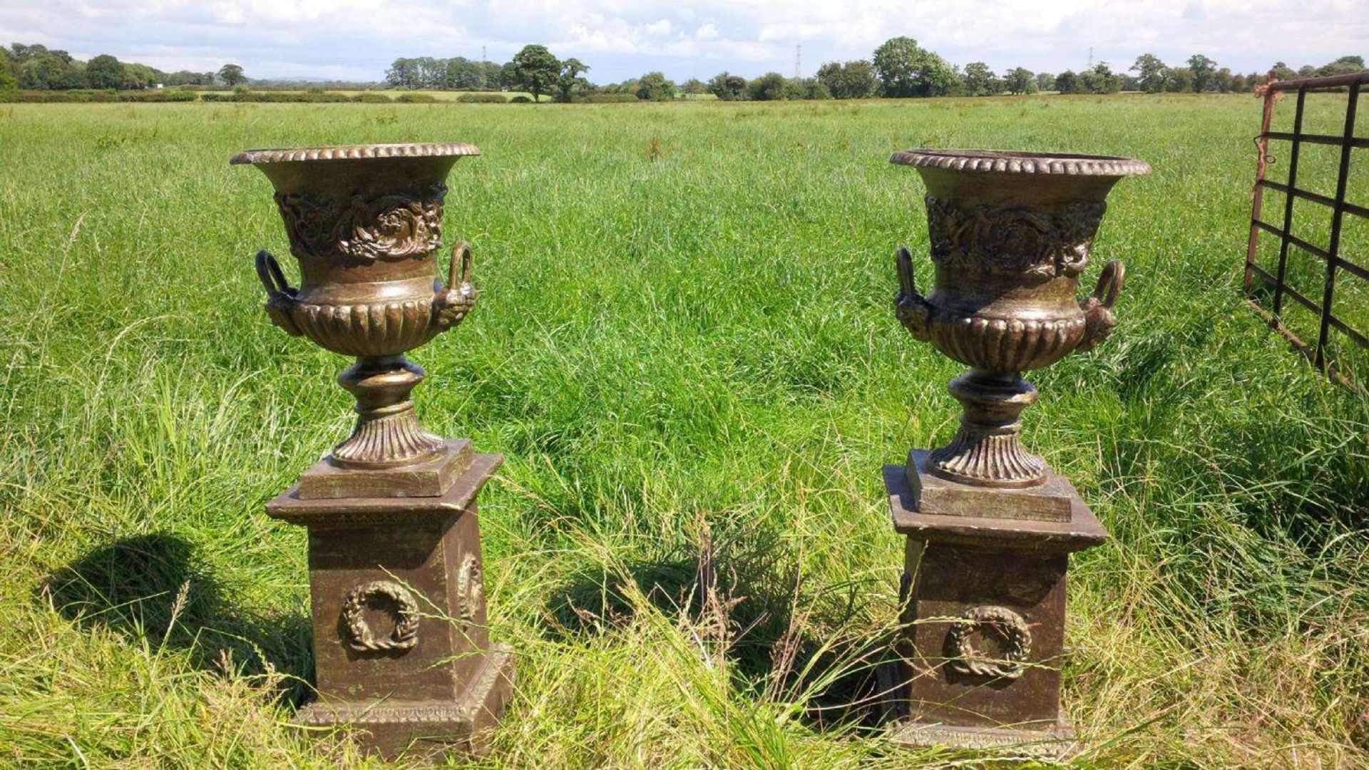 PAIR HEAVY CAST IRON URNS ON PLINTH IN VERDI GREEN BRONZE FINISH