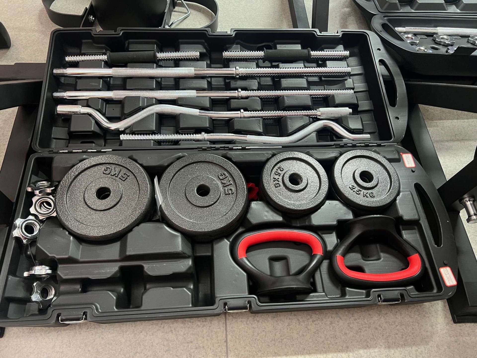 NEW BOXED 55KG BARBELL AND DUMBELL SET