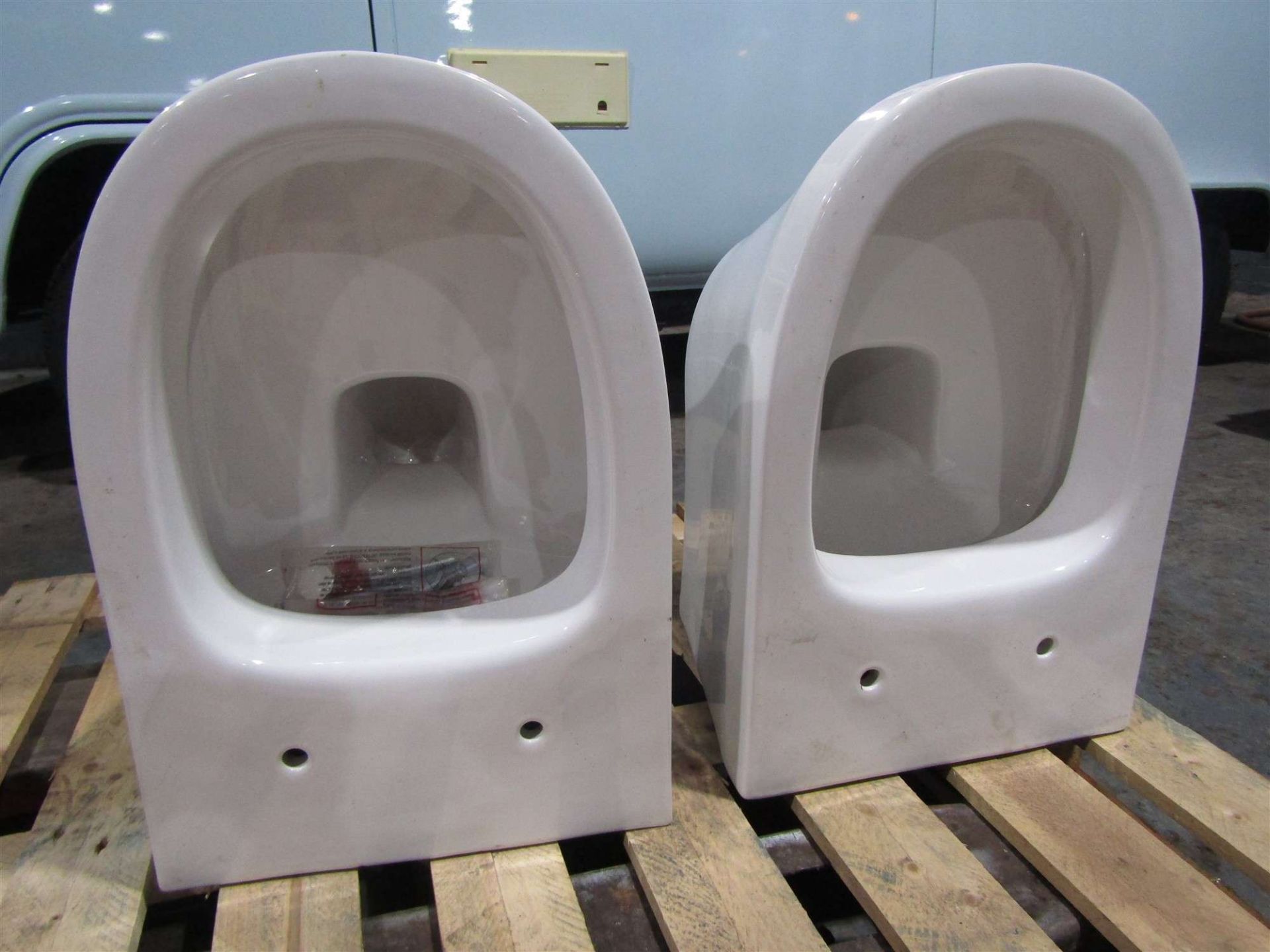 2 X WALL HUNG TOILETS