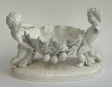 A Spode Copelands china centrepiece, in the form of two cherubs (one af), 33cmW