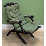 An ebonised folding easy chair, with loose seat and back cushions