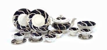 A 19th century part tea service, cobalt blue and gilt decoration, some repairs, comprising teapot,