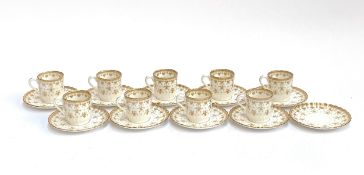 A set of Spode 'Fleur de lis' pattern coffee cups and saucers