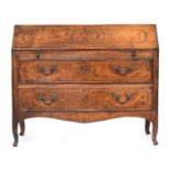 An 18th century French serpentine bureau, the fall front and two drawers inlaid with swags, 119cm