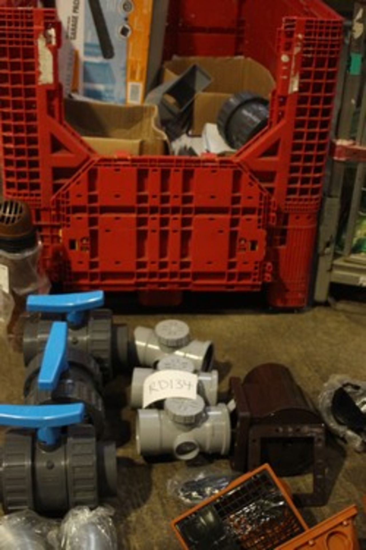 A magnum of drainage products, including 1 x pack of 3 Clark drain garage pack, pipe clips,