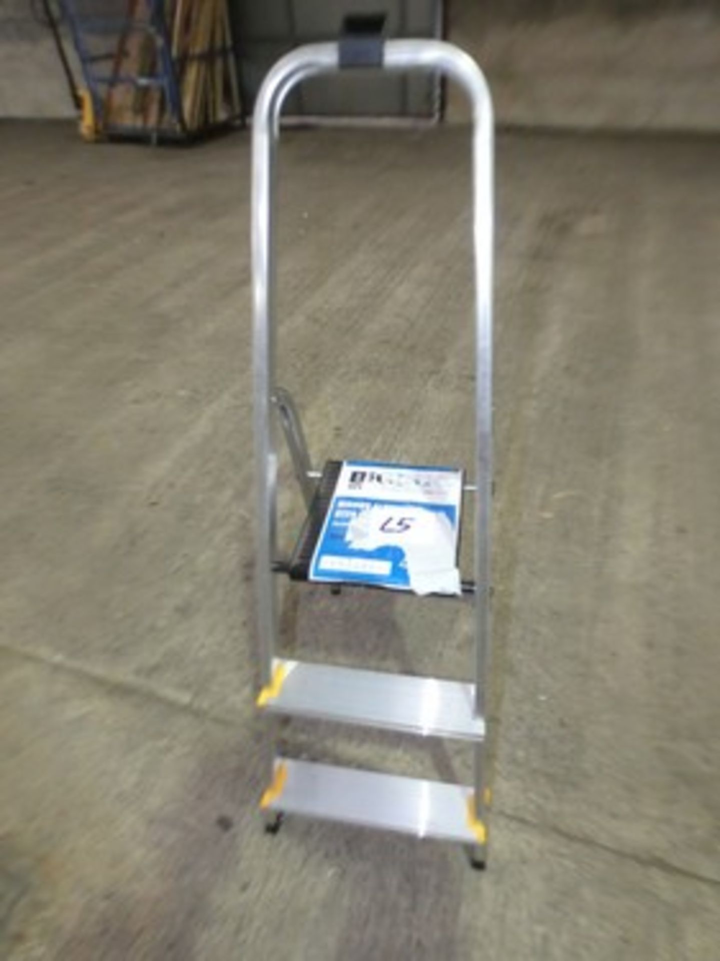 1 x Bid Dug aluminium 3 tread stepladder, date of manufacture 01/2025 and 1 x blue fibreglass 8