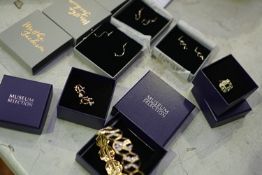 A quantity of costume jewellery, branded Museum Collection and Martha Jackson and a Peanuts