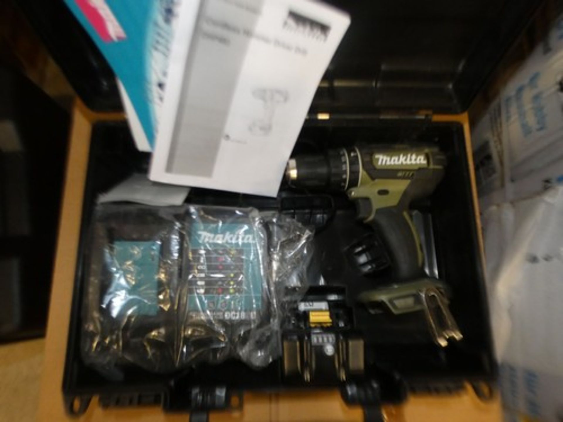 1 x Makita 18V cordless drill, Model DHP482SFO with 1 x 3.0ah battery and 1 x Makita DC18RC 18V
