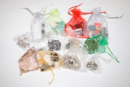 A collection of silver plated hand made jewellery set with polished stones