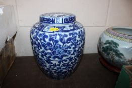 A Chinese blue and white jar and cover with floral