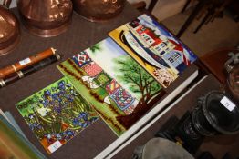 A decorative ceramic plaque depicting Aldeburgh seafront; another of geese in a garden and a smaller