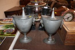 A pair of 19th Century pewter chestnut urns