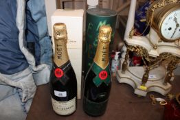 Two bottles of Moet & Chandon Champagne, one 1993, both with original boxes