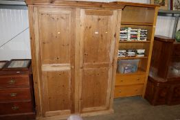 A pine two door wardrobe